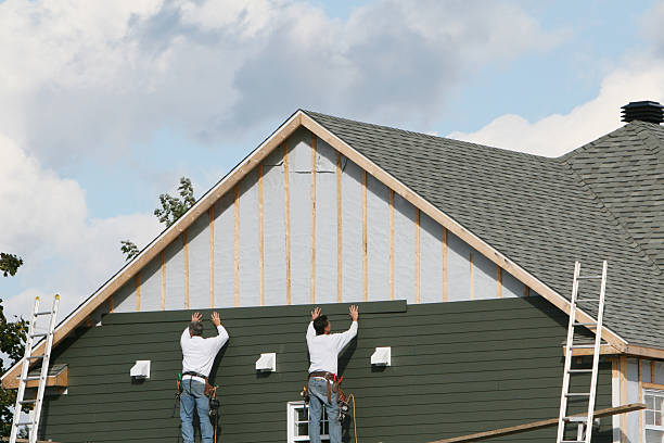 Professional Vinyl Siding technician working in Sims, NC